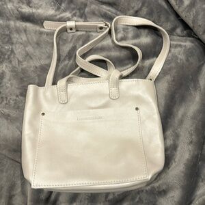 Portland leather mini crossbody. Pearl color. Never used.
